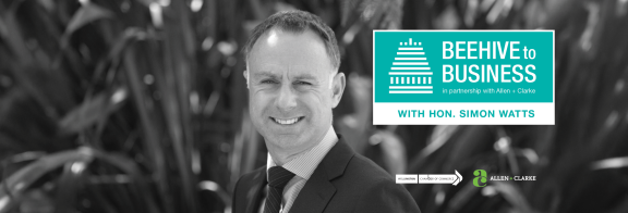 Simon Watts smiles to the camera, with text reading "Beehive to Business with Hon. Simon Watts"